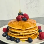 Brighten up your morning with our vegan pancakes topped with fresh berries! These light and fluffy pancakes are a delightful way to start your day, packed with flavor and wholesome goodness