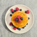 Looking for a delicious vegan breakfast option? Try our easy vegan pancakes with berries recipe! Made with simple ingredients and bursting with fruity flavor, these pancakes are sure to impress